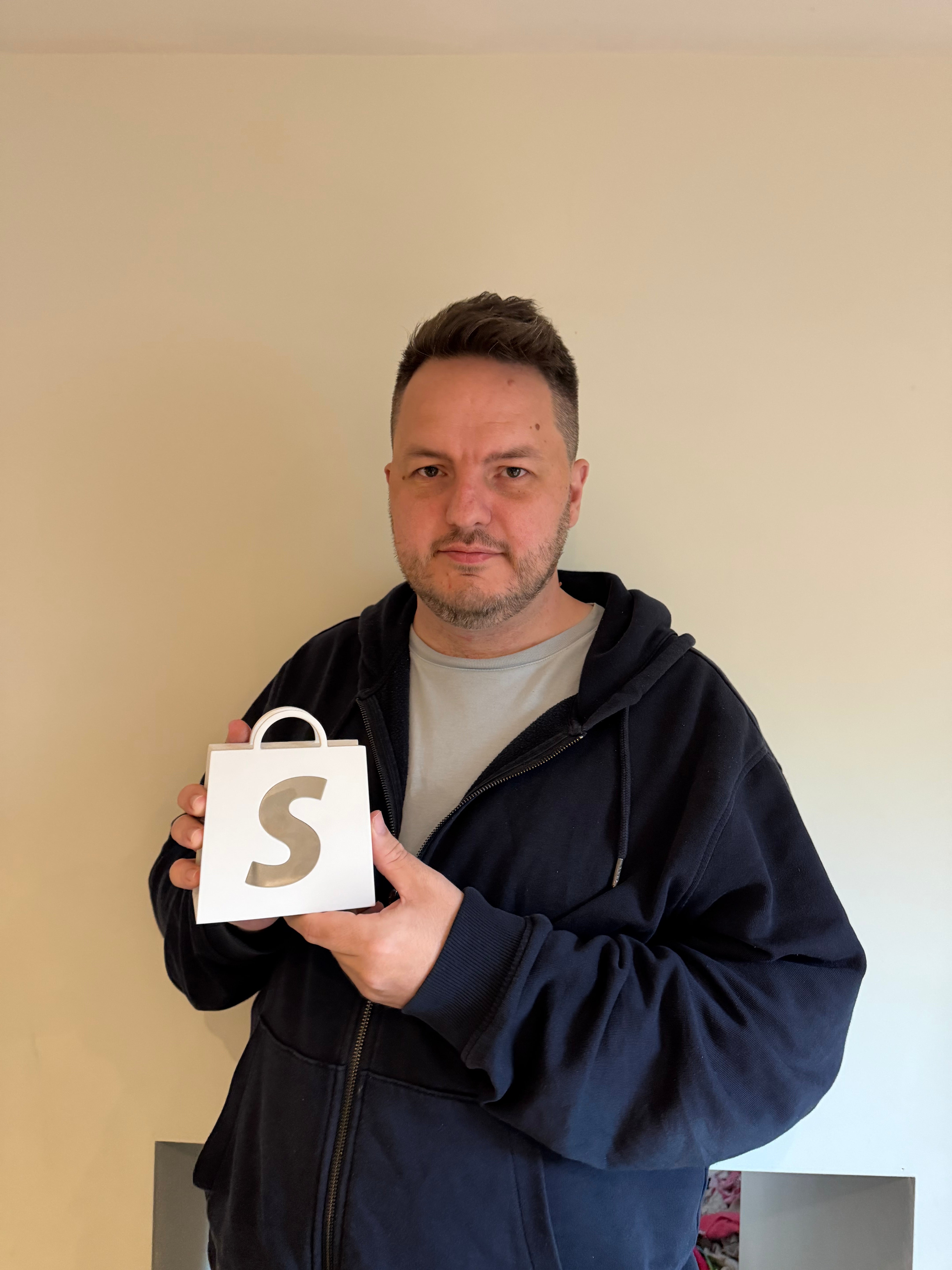 Dean Keating with Shopify Award