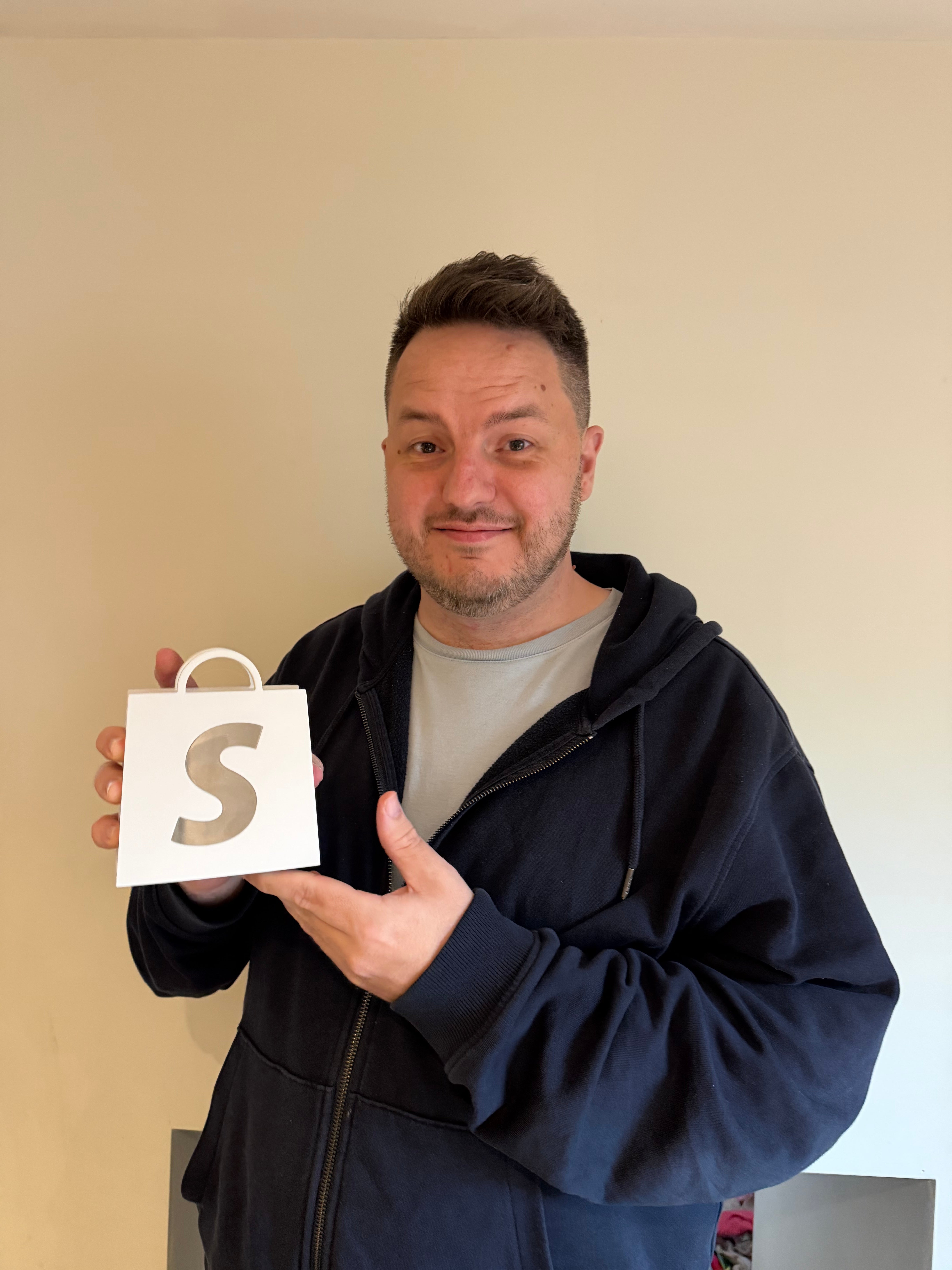 Dean Keating with Shopify Award